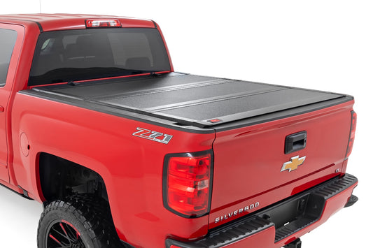Rough Country - Hard Tri-Fold Flip Up Bed Cover - 6'7 In. Bed - Rail Cap - Chevy/GMC 1500/2500HD/3500HD (14-19)